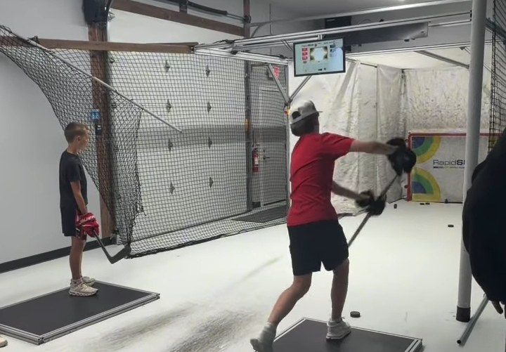Player shooting in the RapidShot cage