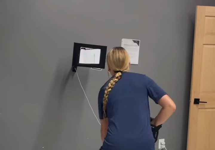 Player stickhandling while reading the overhead screen